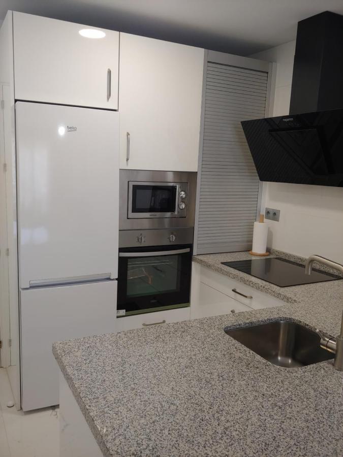 Apartamento 315 En Paseo Maritimo 96 ฟูเอนฮิโรลา ภายนอก รูปภาพ